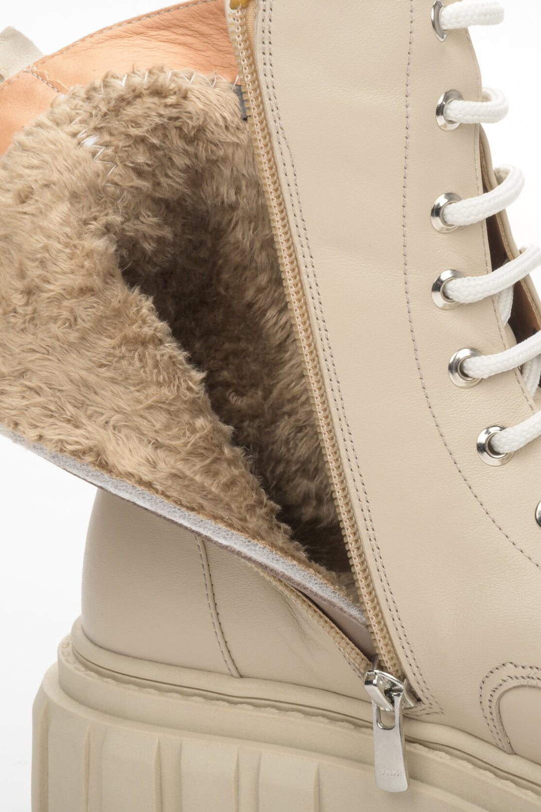 Women's beige boots for winter by Estro - close-up on details.