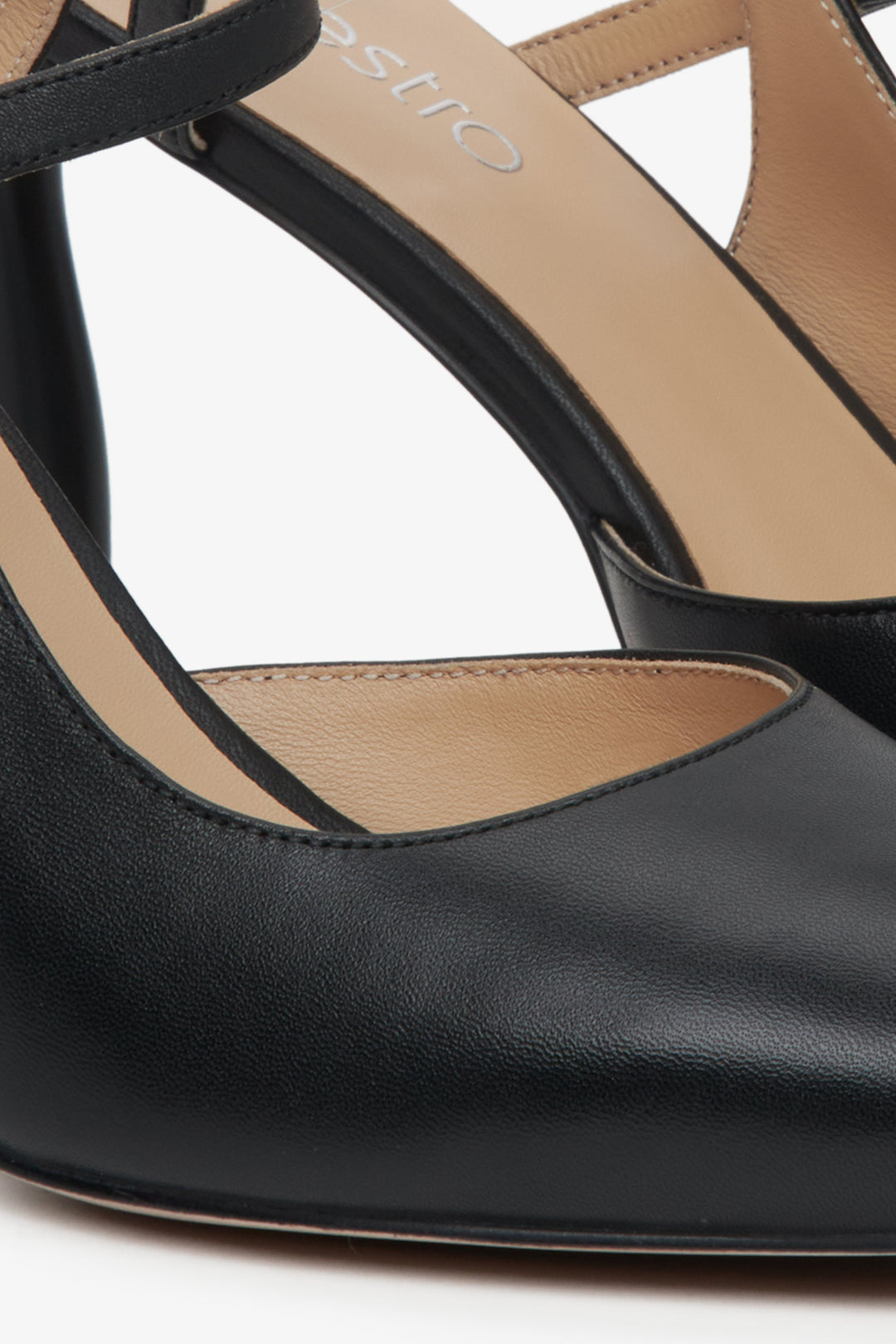 Women's black slingback heels with a pointed toe - a close up on detaiks.