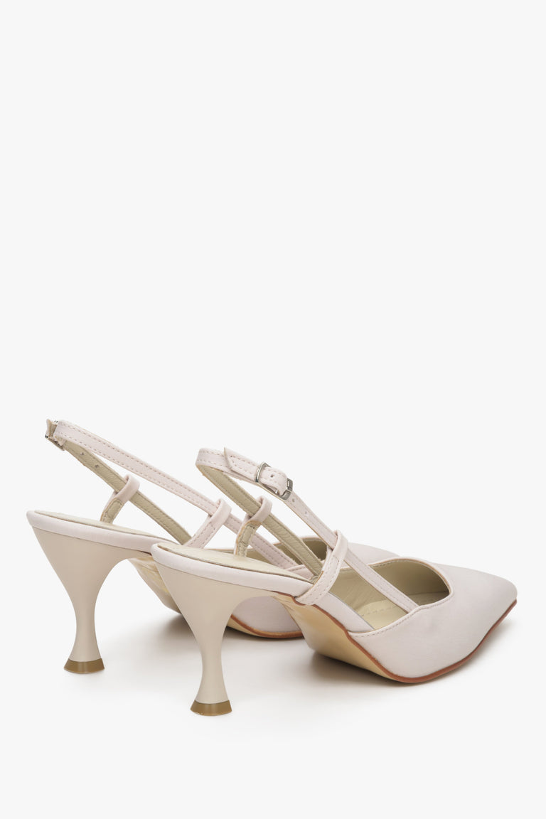 Light beige, pointed toe women's slingback shoes on a funnel heel - presentation of the edges.