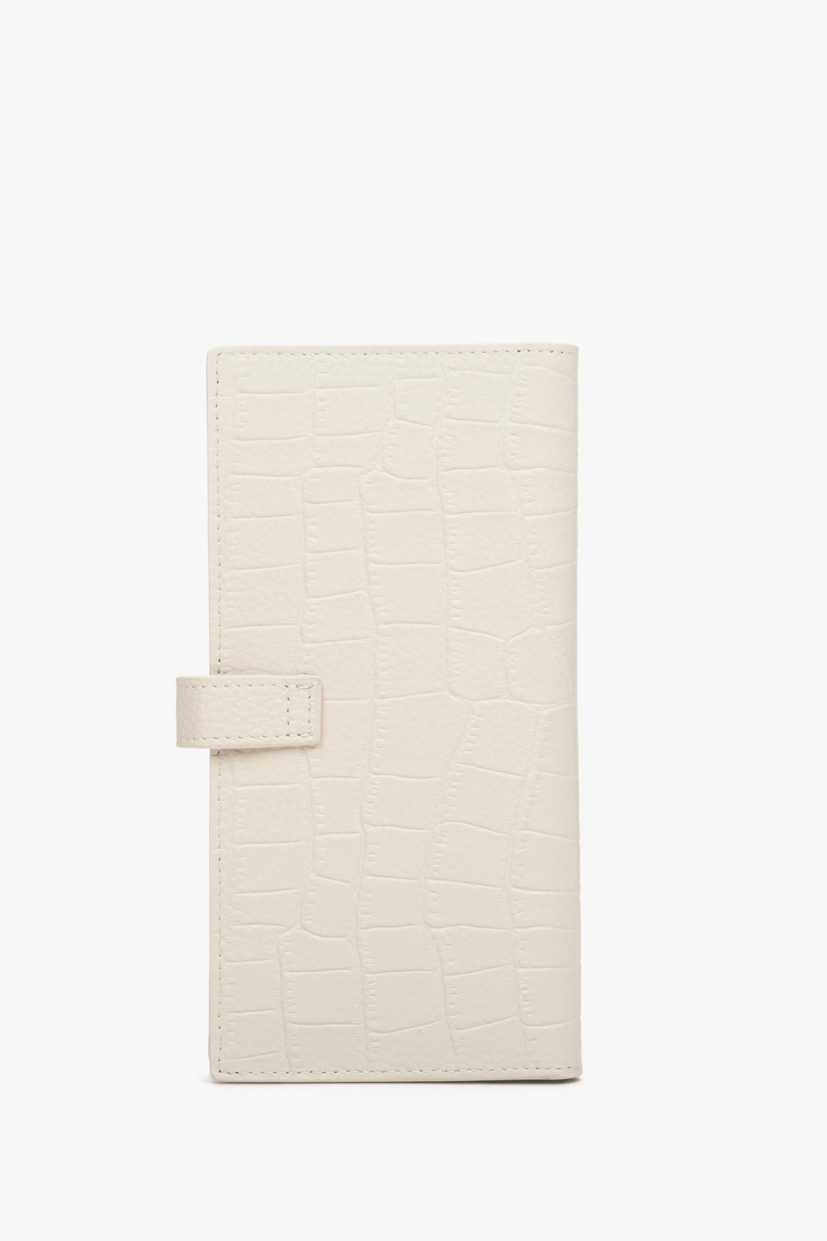 The back of a large light beige women's wallet made of embossed genuine leather with silver details by Estro.