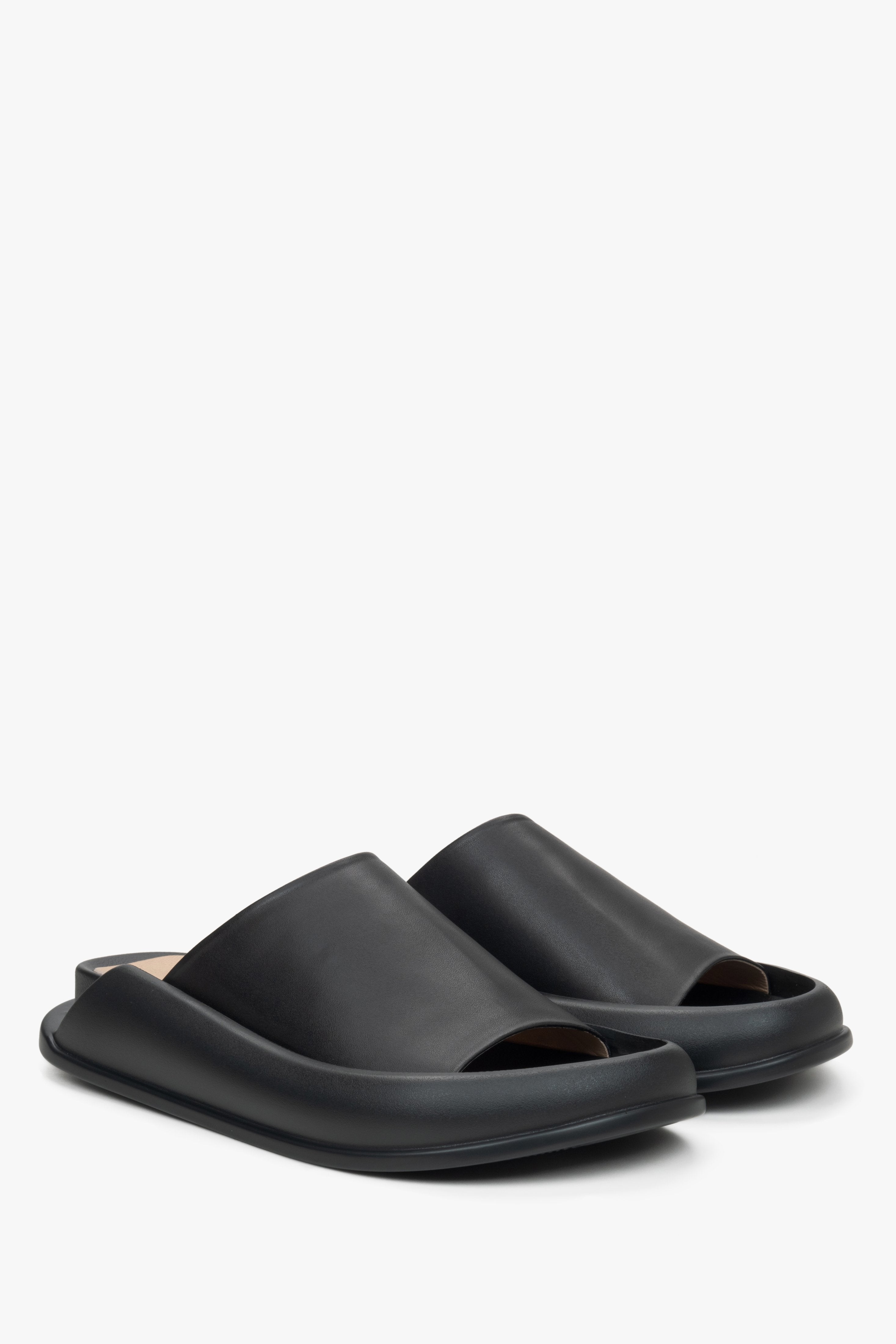 Women's black slide sandals made of soft genuine leather by Estro.