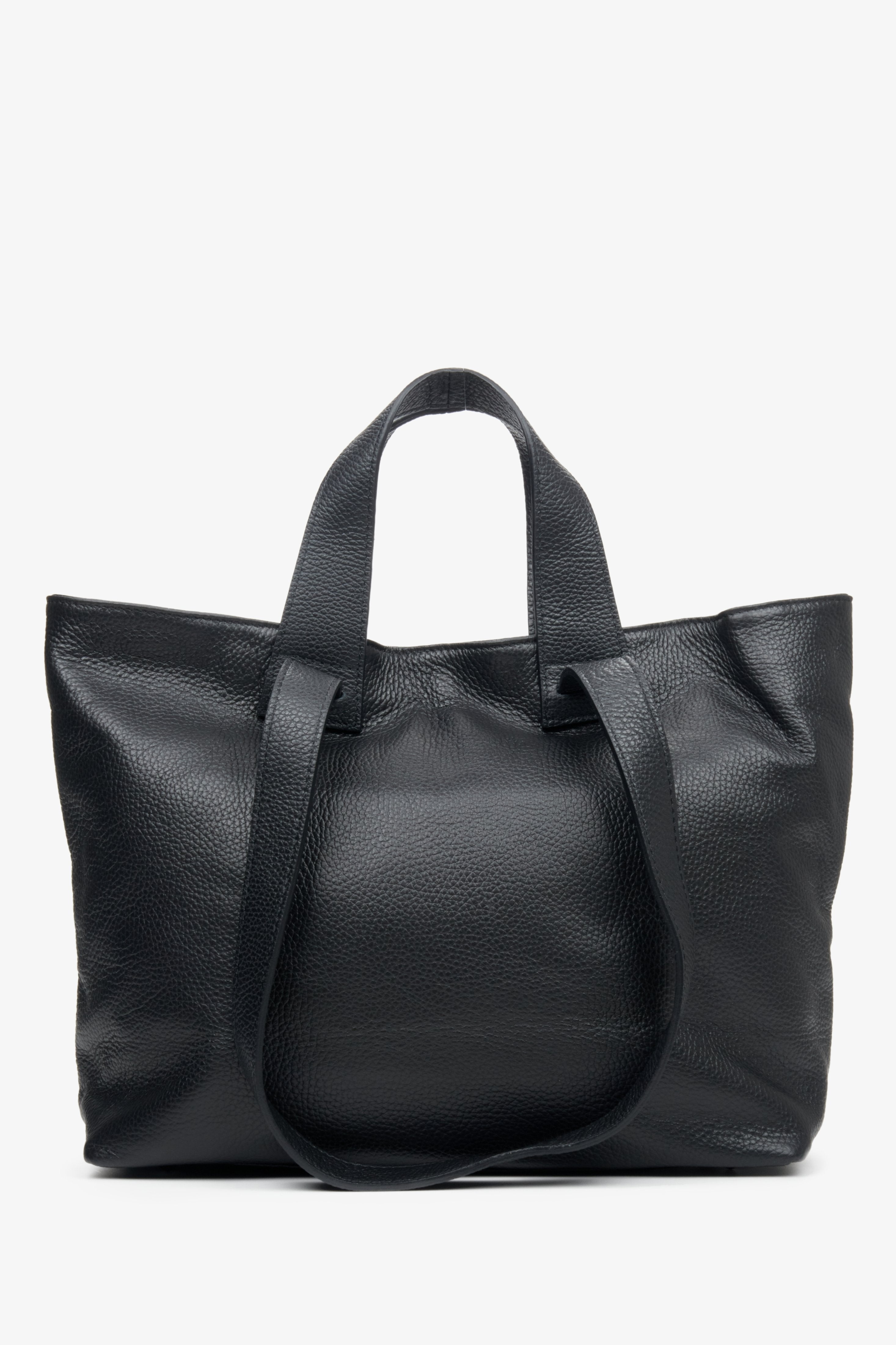 Women's large black shopper-style handbag.