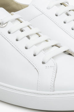 Women's white leather sneakers by Estro with laces for fall - close-up on the details.