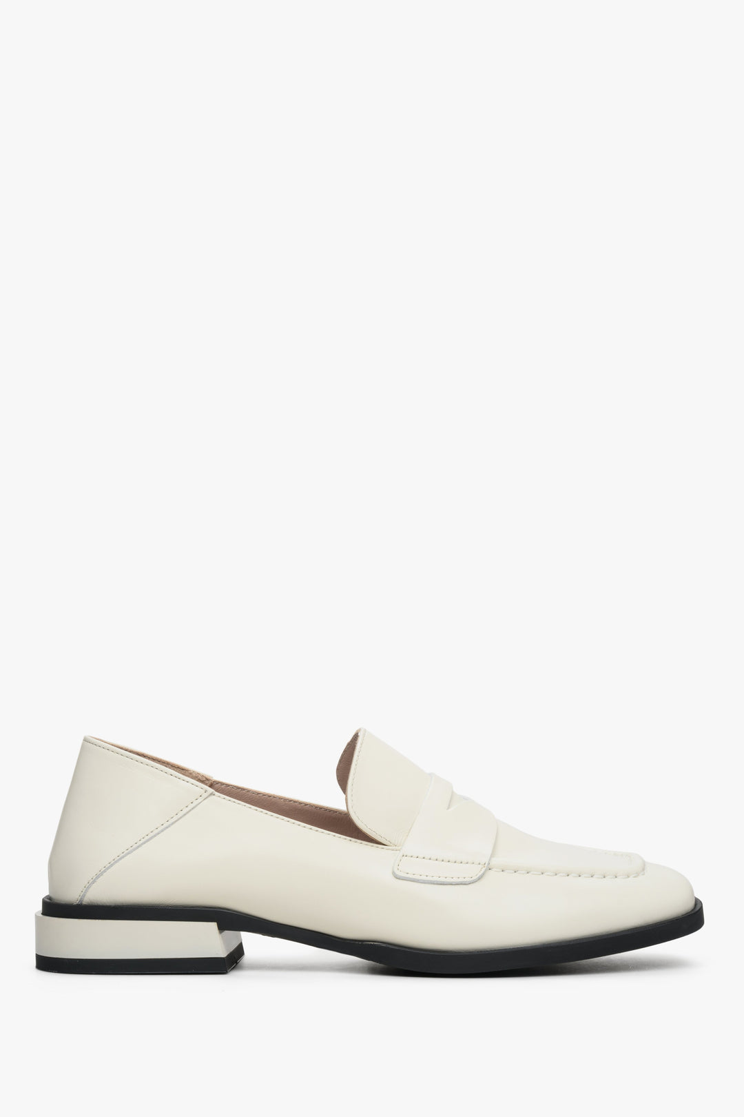 Women's white leather loafers with a low heel by Estro - shoe profile presentation.