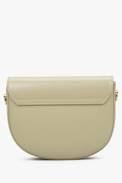Estro women's beige bag - back view of the model.