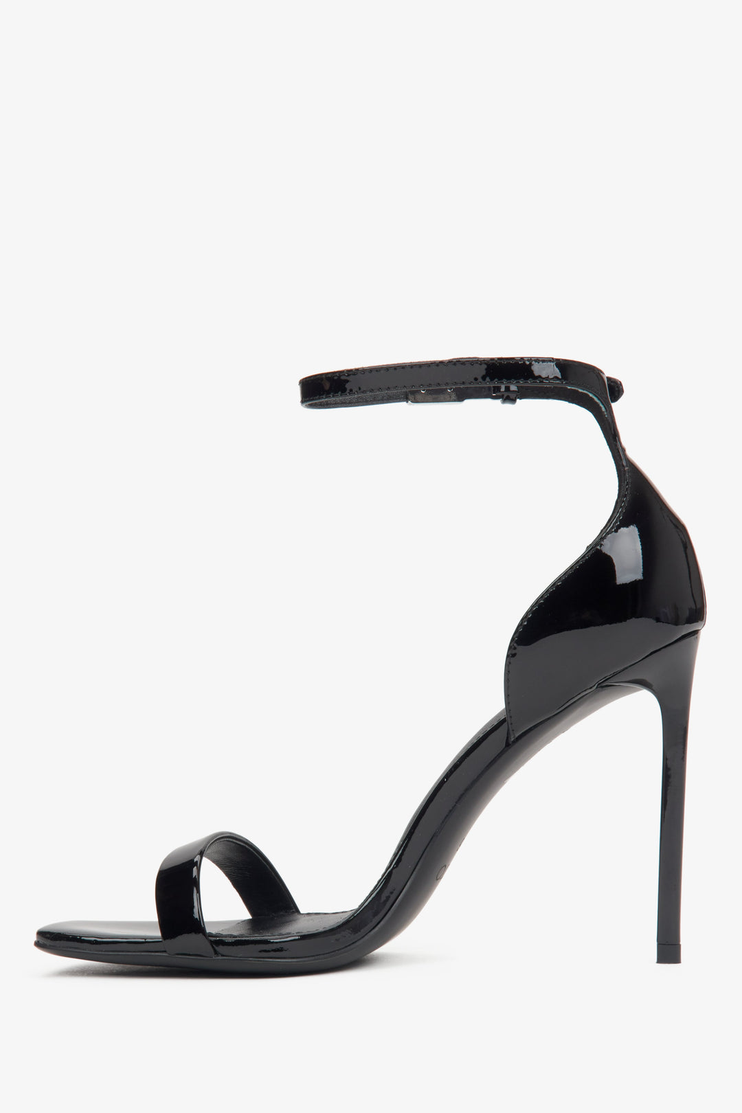 Black women's sandals made of patent natural leather with a high heel by Estro.