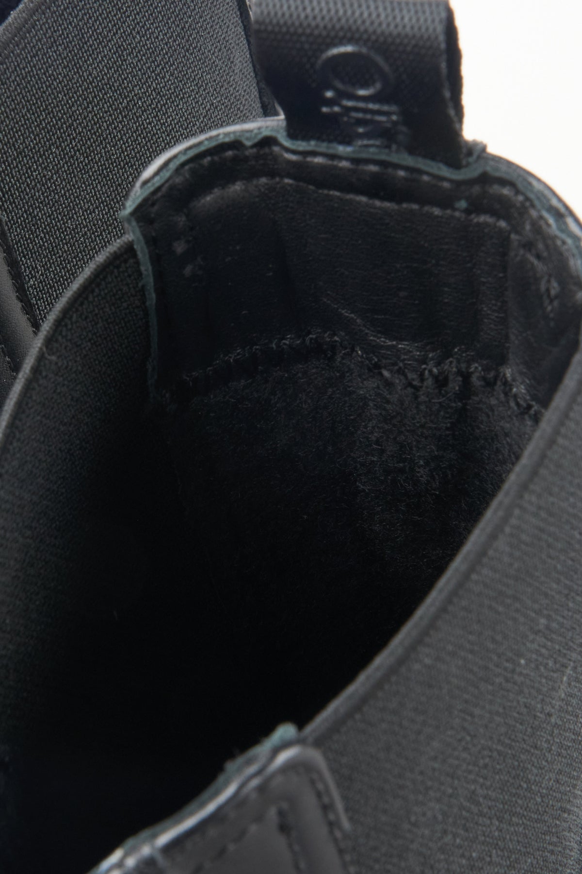 Women's black ankle boots by Estro - close-up of the interior.