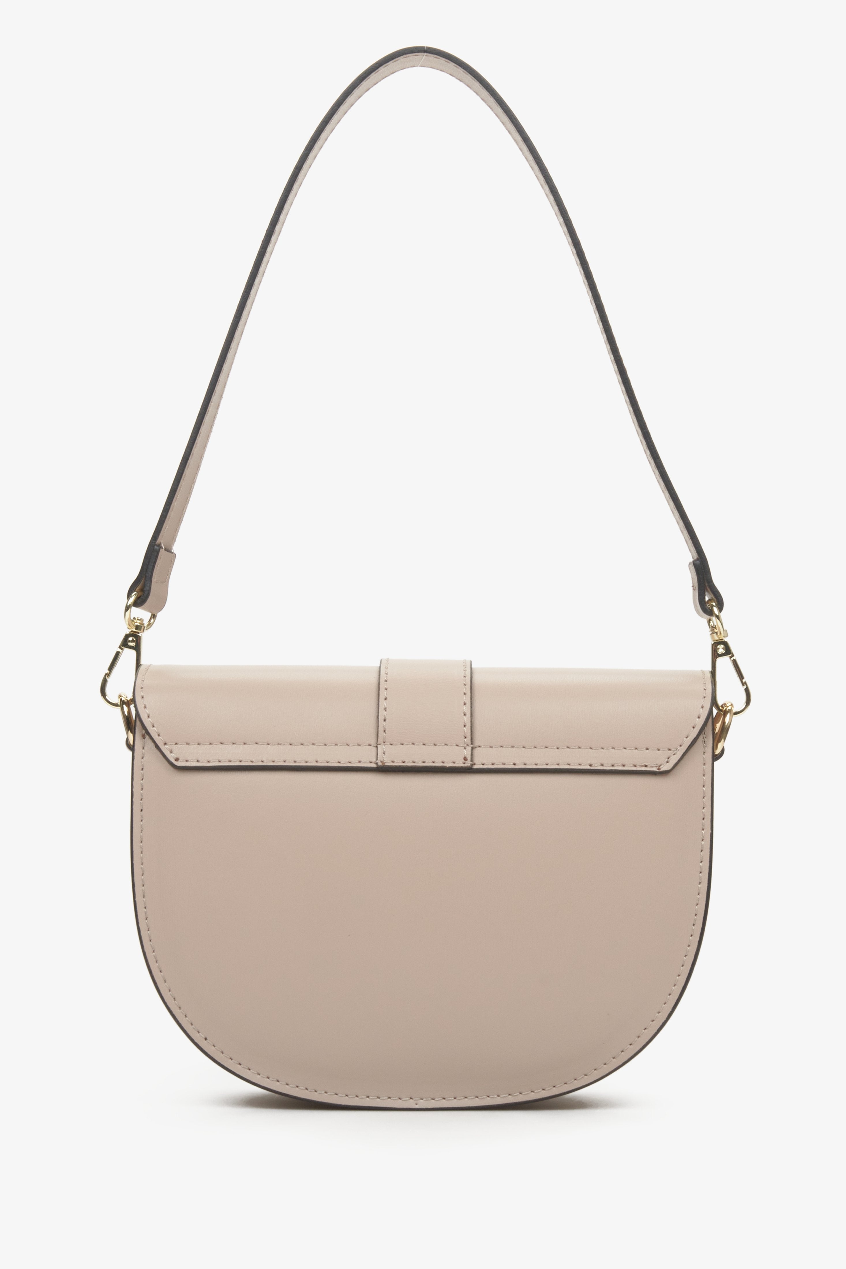 Women's beige shoulder bag made from genuine leather in the shape of a horseshoe.