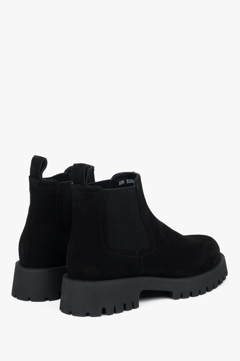 Women's black low chelsea boots by Estro - close-up of the heel and side line of the shoes.