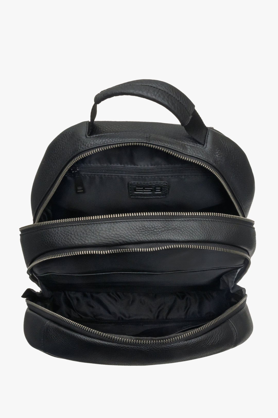 A spacious men's  black leather backpack from ES8 - close-up on the interior of the model.