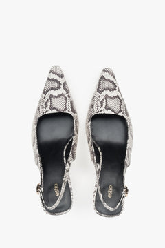 Elegant black and grey women's slingback pumps with a low heel, made of genuine leather by estro.