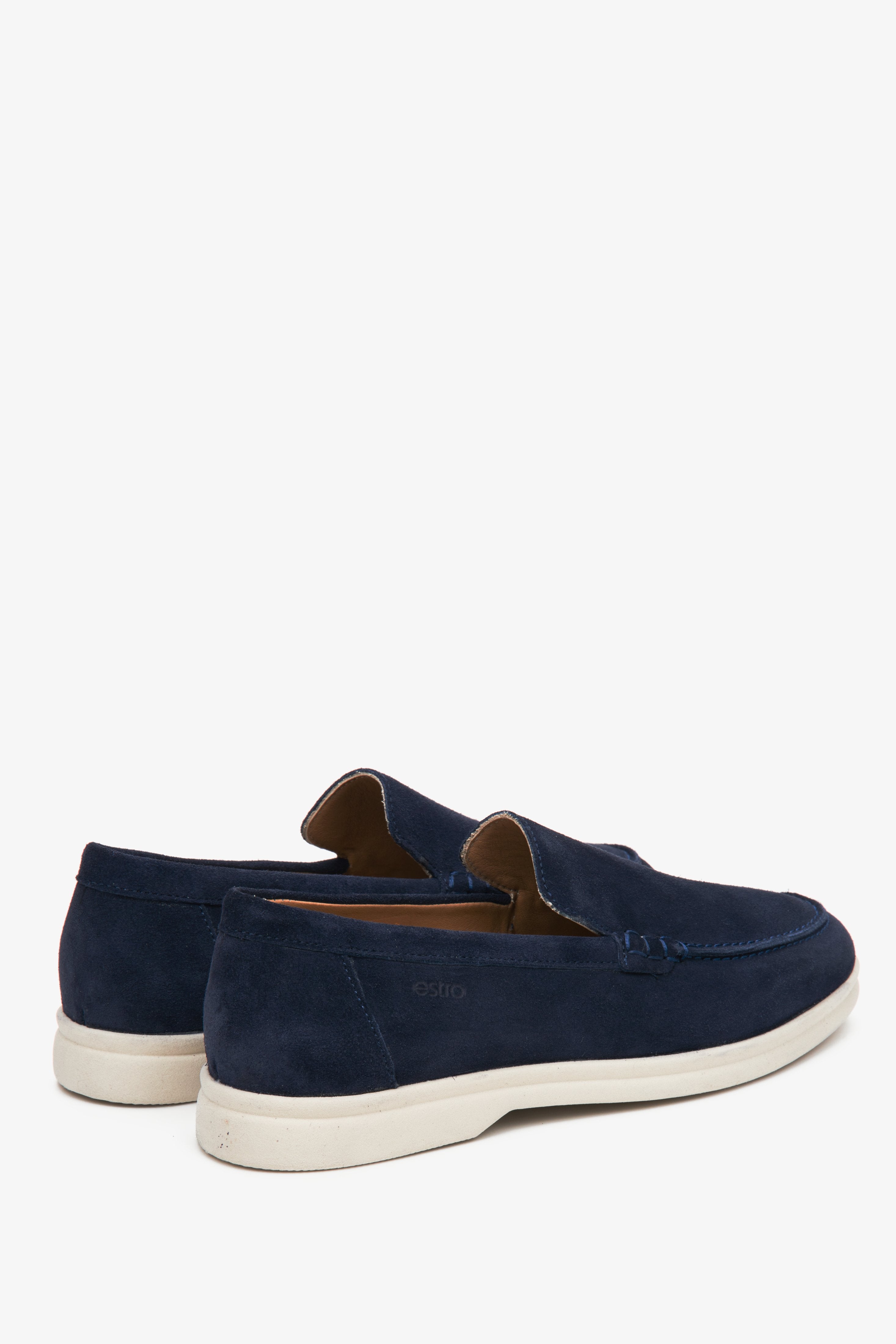 Feminine navy blue velour loafers - presentation of the heel counter and shoe sideline.
