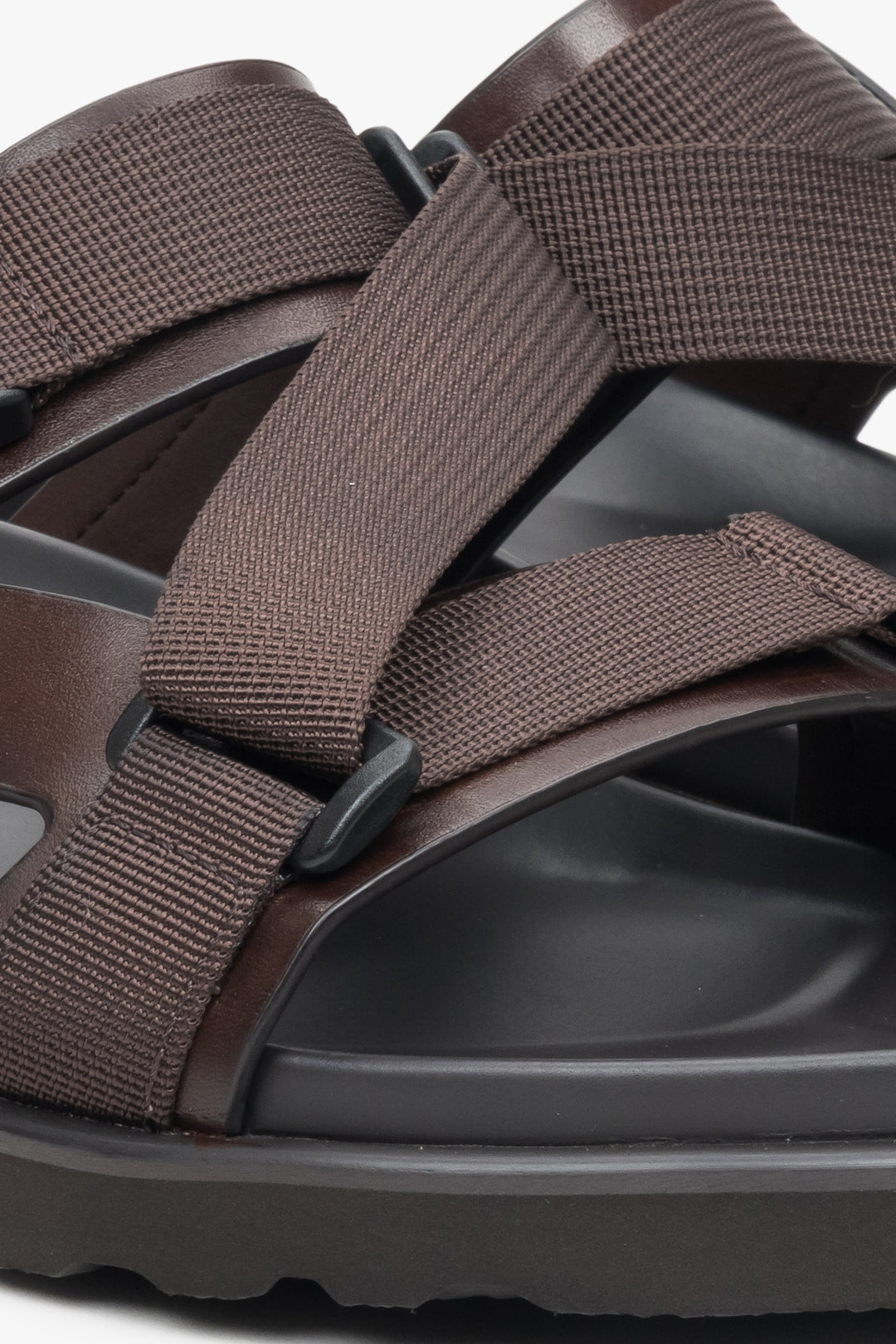Men's dark brown Estro leather-textile slides - close-up on the fastening system.