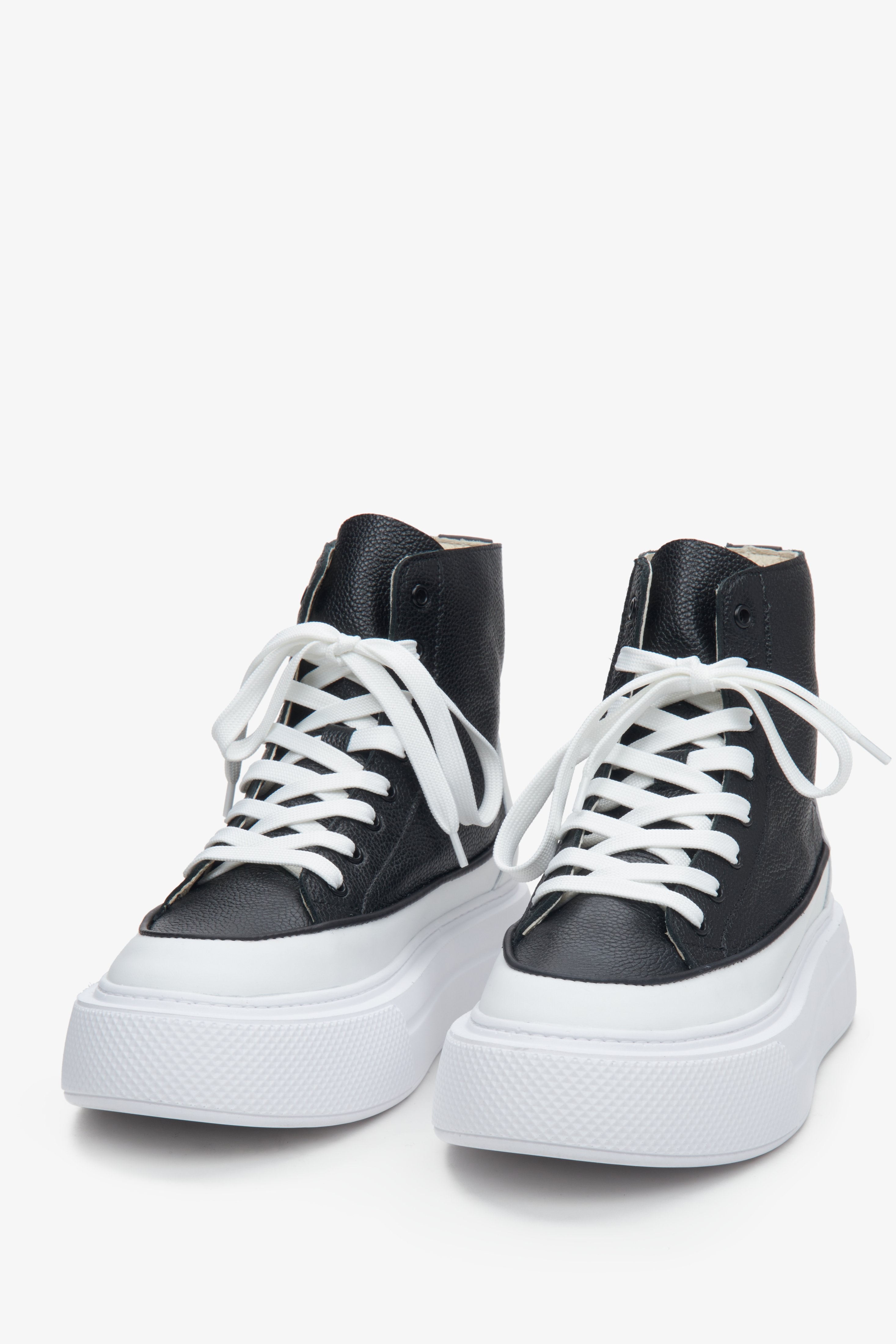 High-top leather women's sneakers by Estro - close-up of the lacing system.