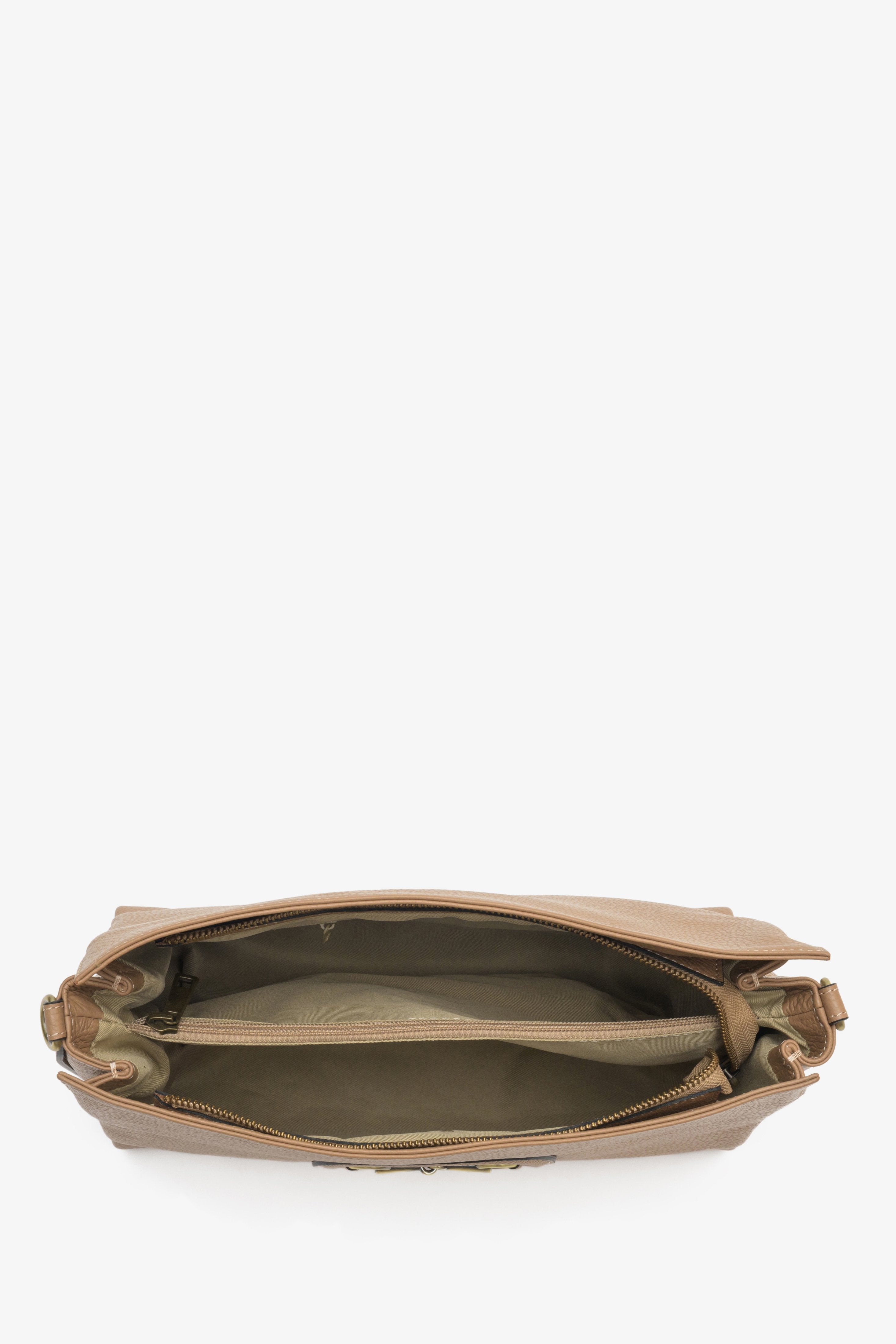 Large beige Estro women's handbag with gold accents - close-up of the interior of the model.