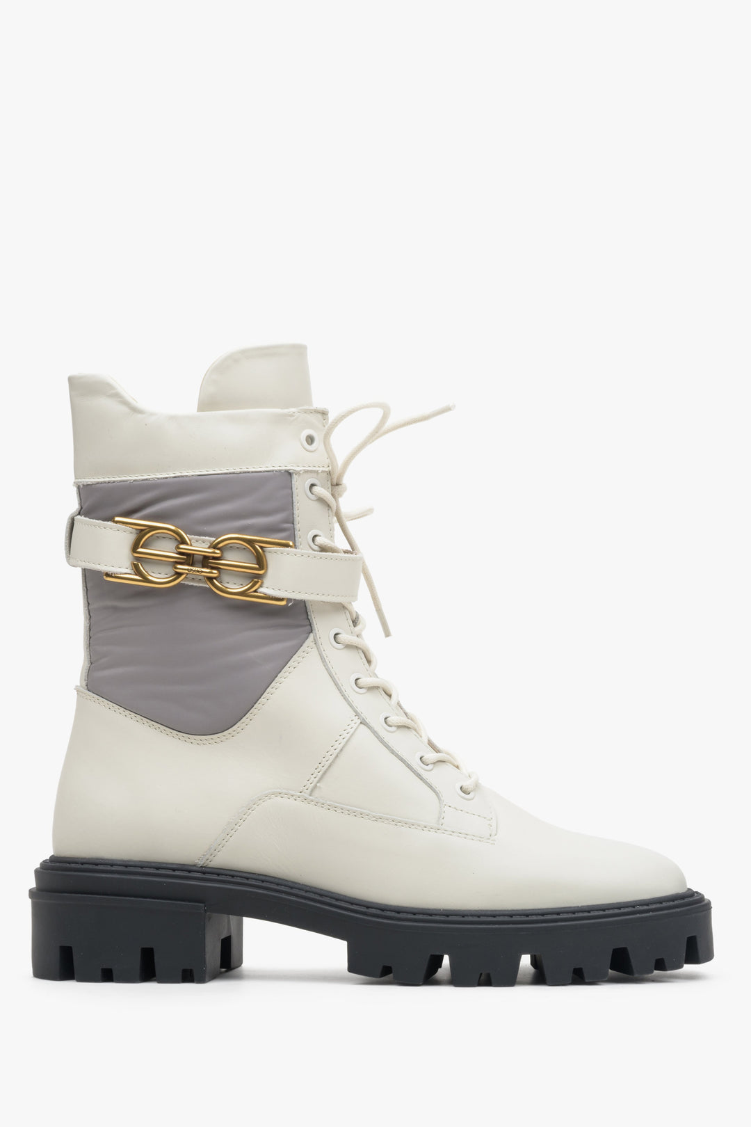 Beige-grey women's ankle boots with a gold buckle - shoe profile.