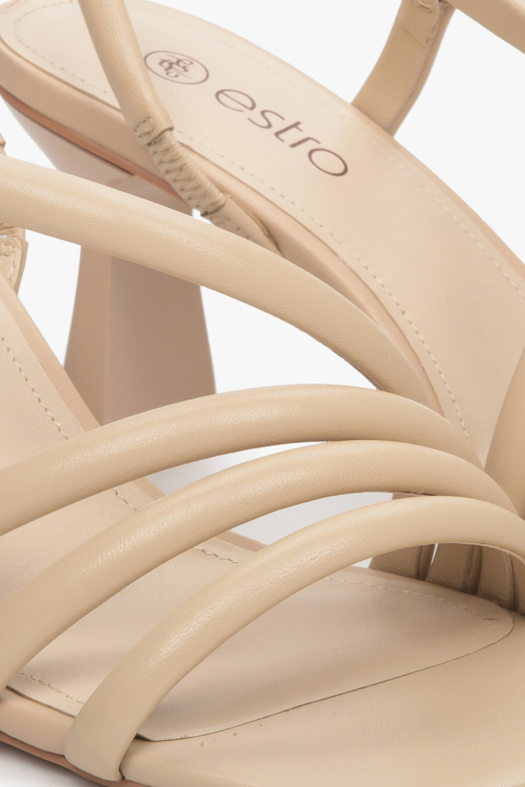 Women's strappy sandals in beige made of natural leather by Estro - a close up on details.