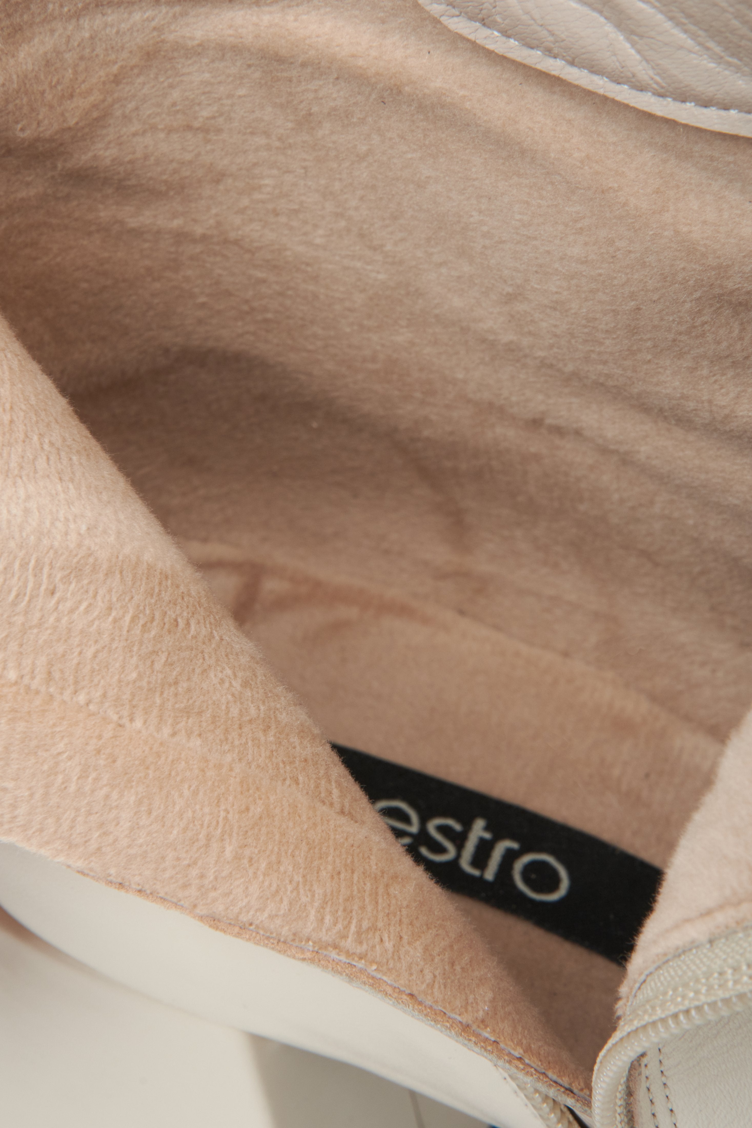 Estro light beige leather women's boots - close-up on the soft interior.