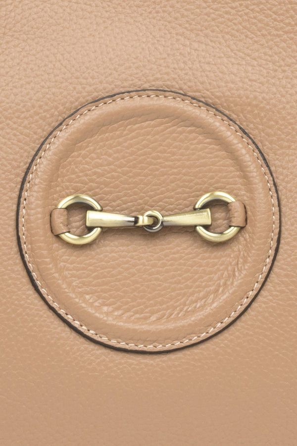 Spacious, beige leather women's handbag by Estro with gold accents - close-up on the details.