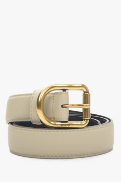 Beige women's belt with gold buckle Estro.