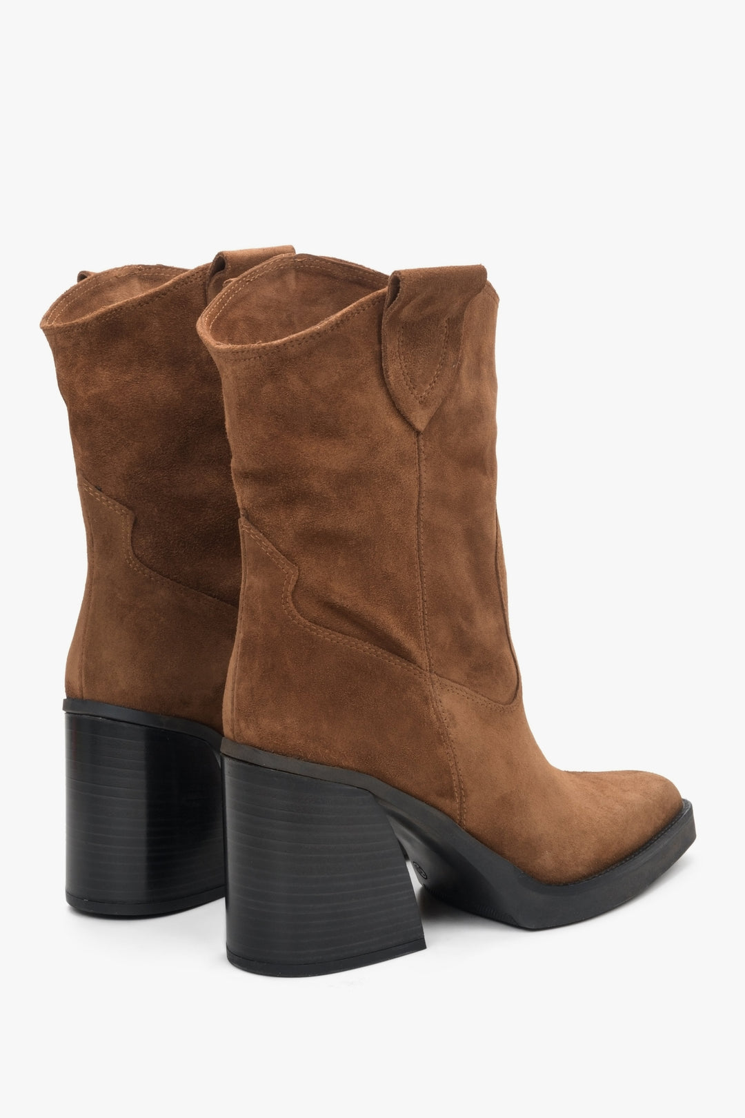 Brown women's suede cowboy boots on a sturdy block heel.