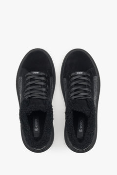 Women's black insulated winter sneakers by Estro - top view of the model.