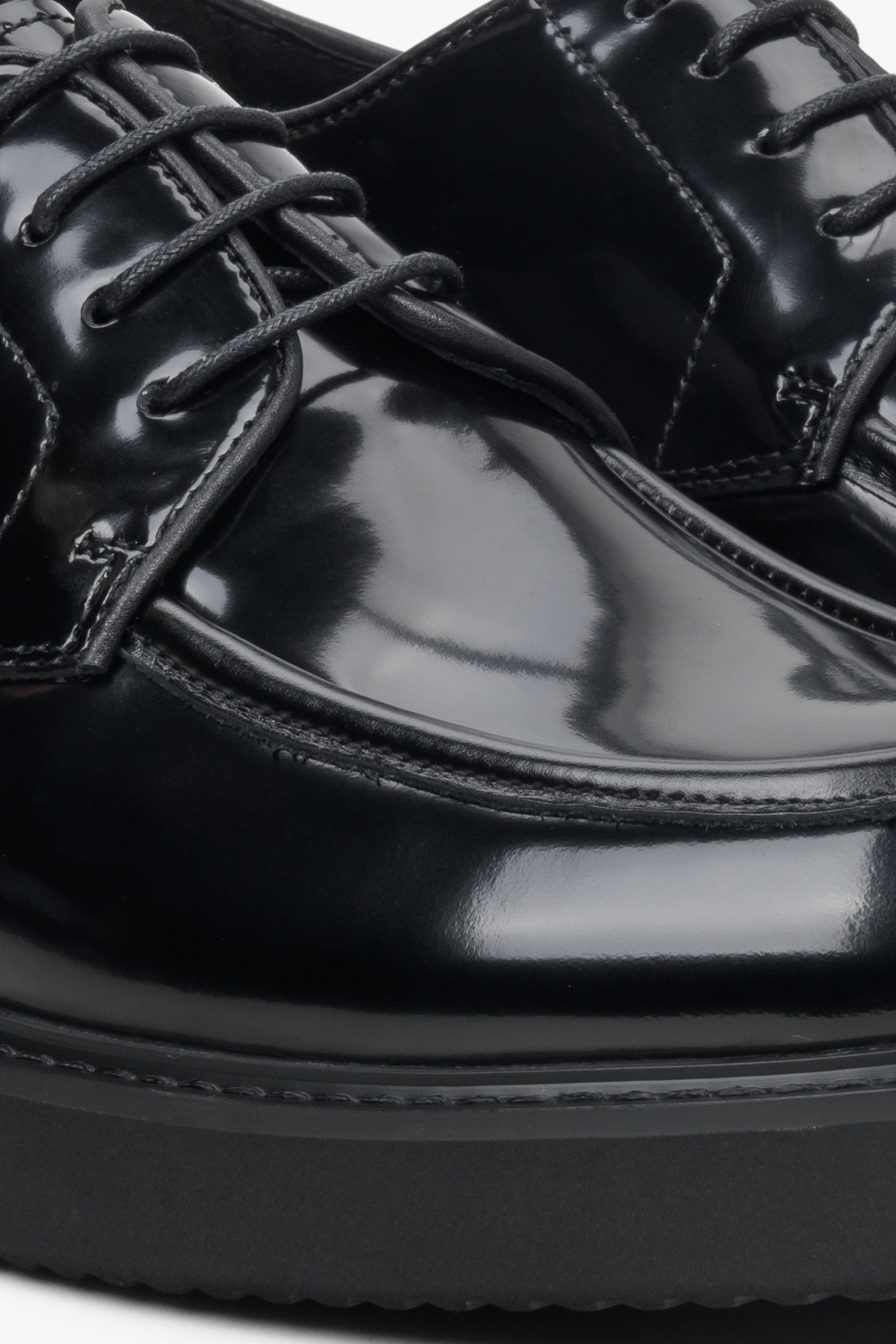 Men's black leather Estro brogues - close-up on the details.