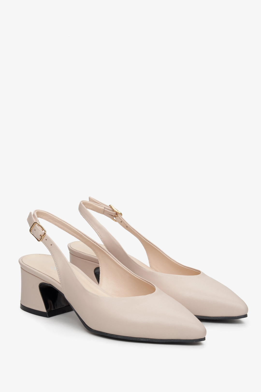 Women's beige open-back pumps by Estro.