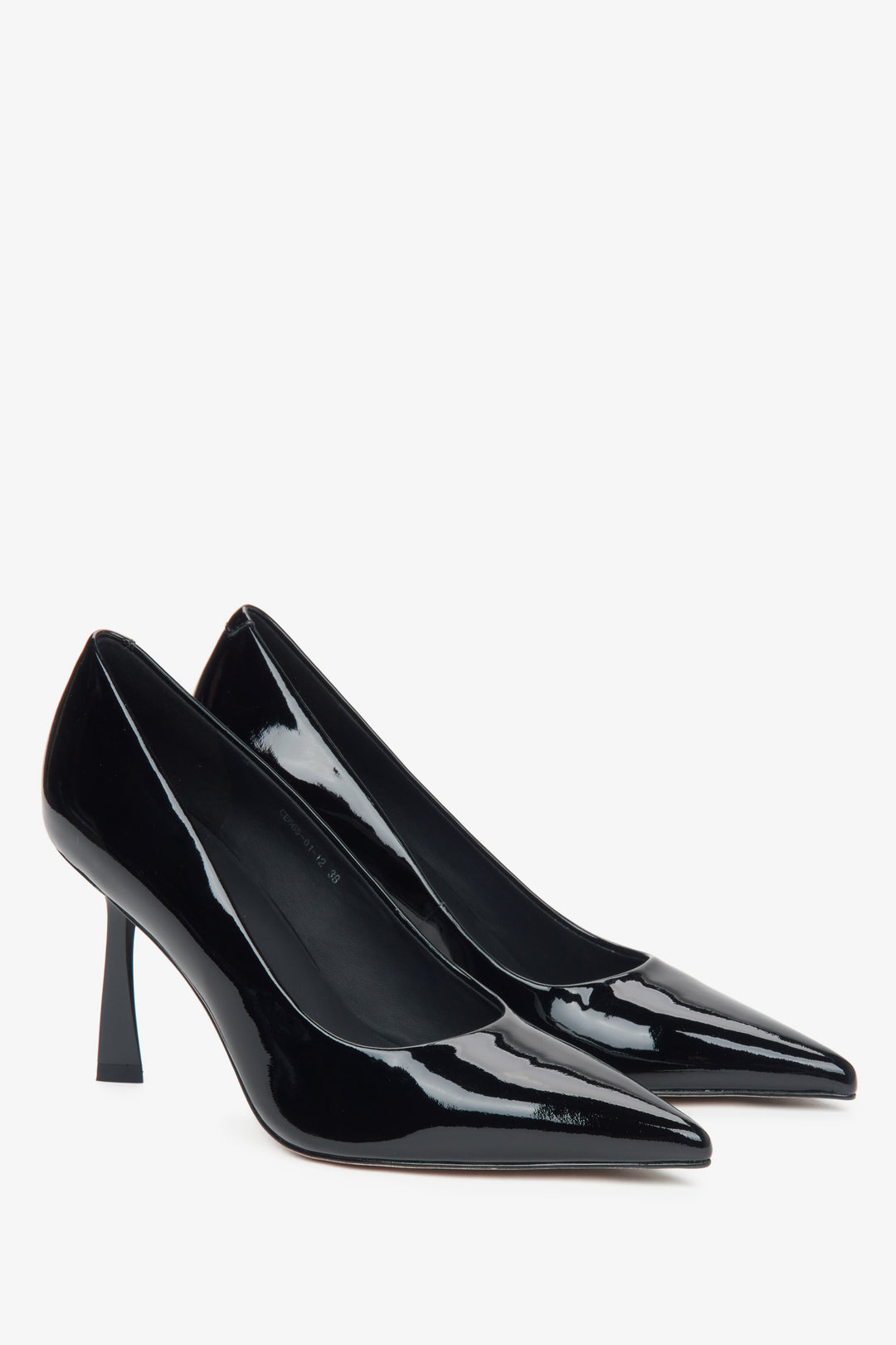 Estro black high heels made of patent genuine leather with a pointed toe - close-up of the side line of the shoes.