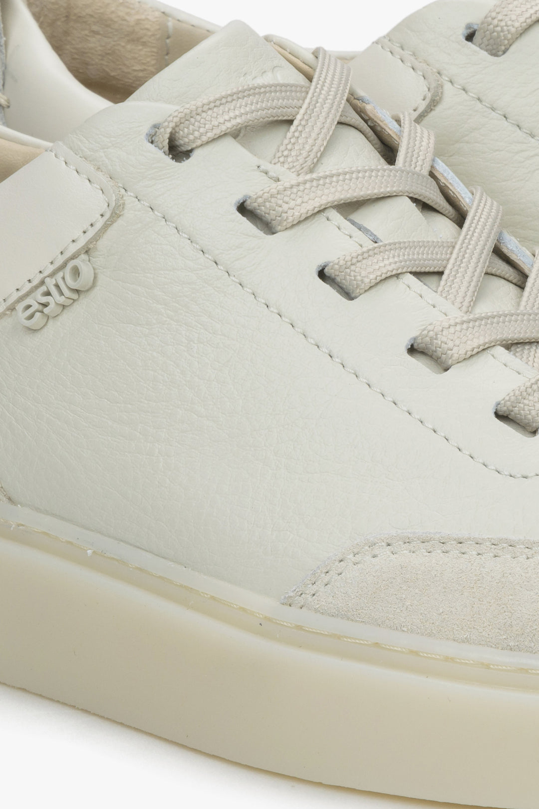 Beige women's sneakers made of genuine leather and velour by Estro - close-up on details.