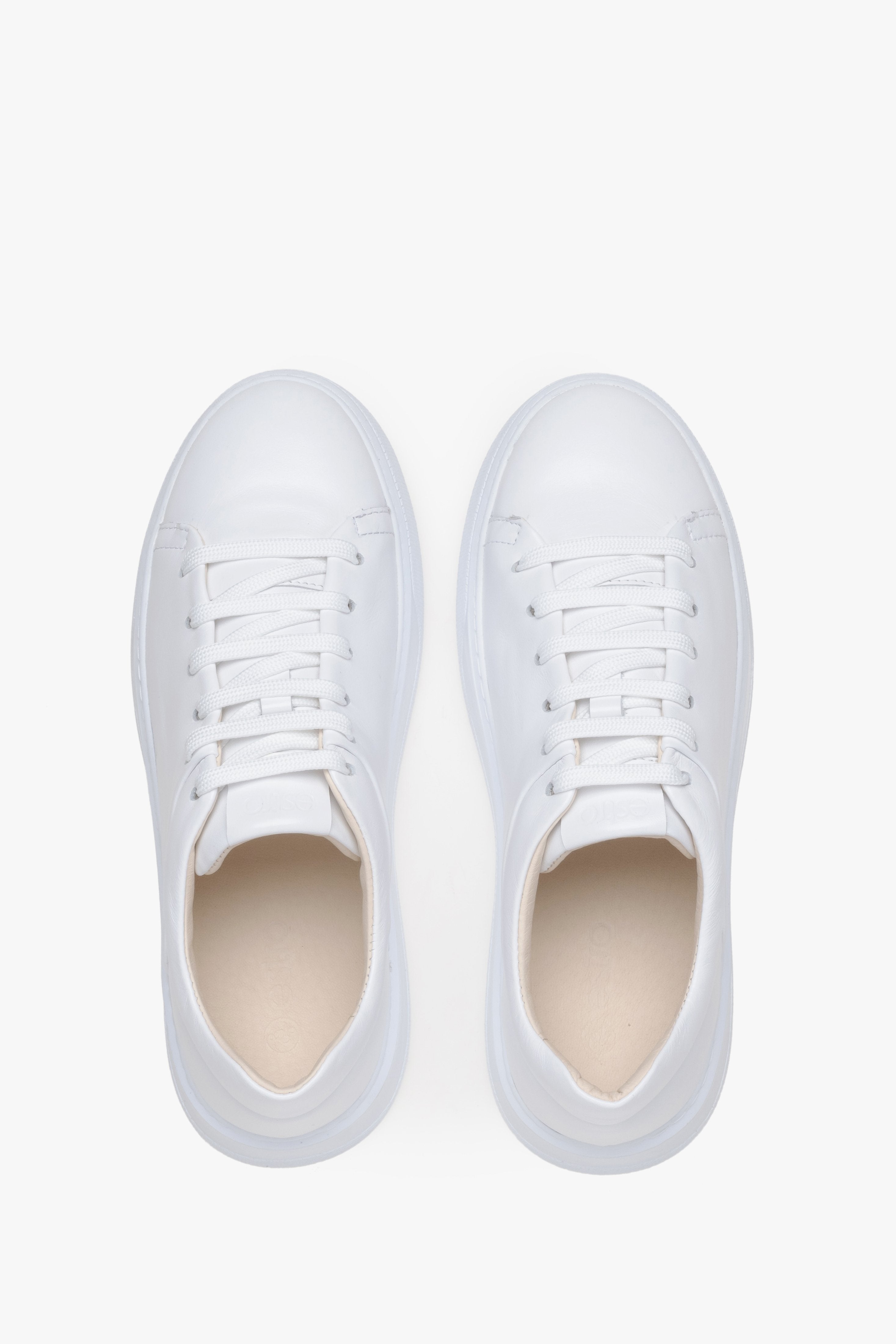 White leather women's sneakers - top view presentation.