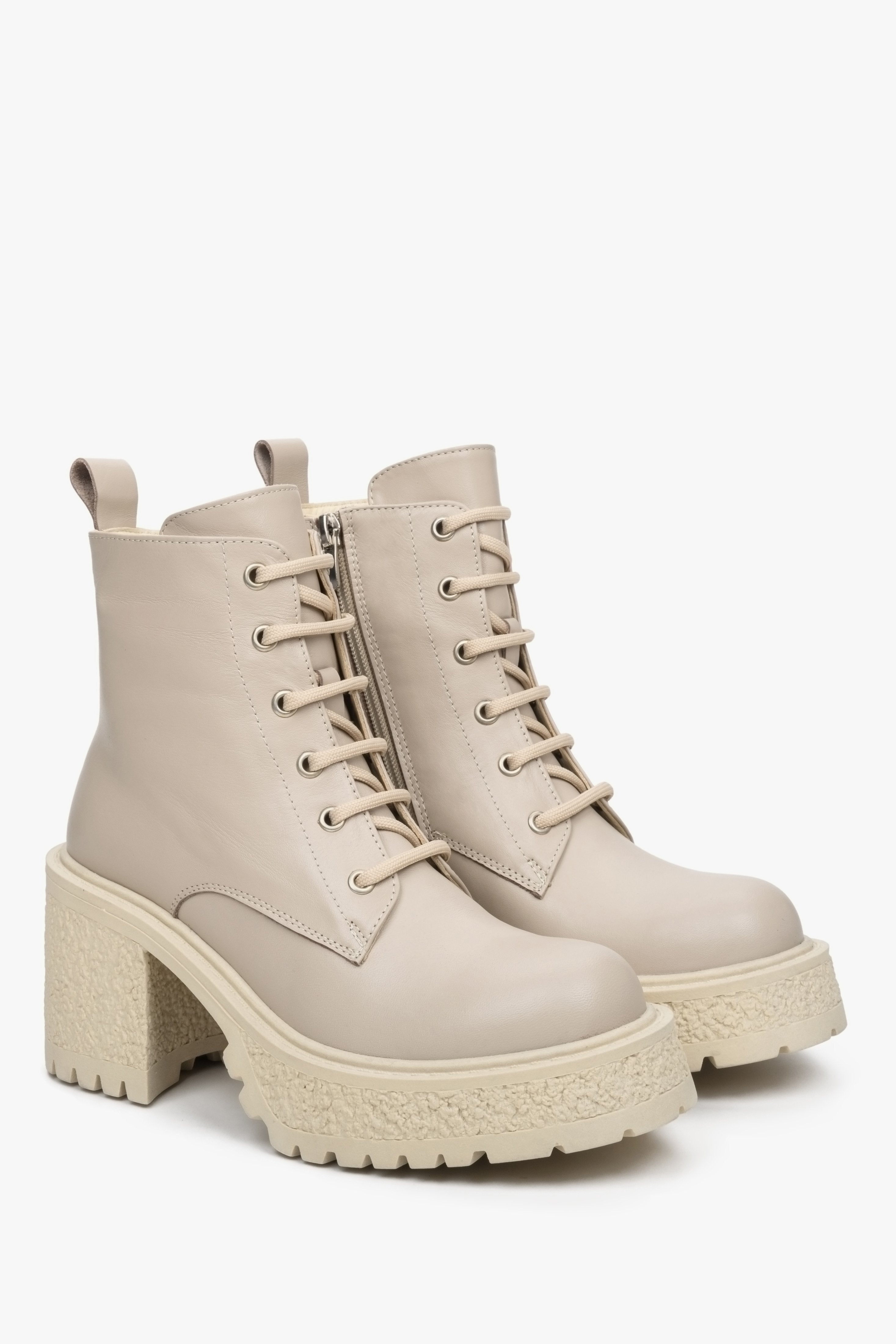 Beige women's leather ankle boots with a stable heel by Estro.