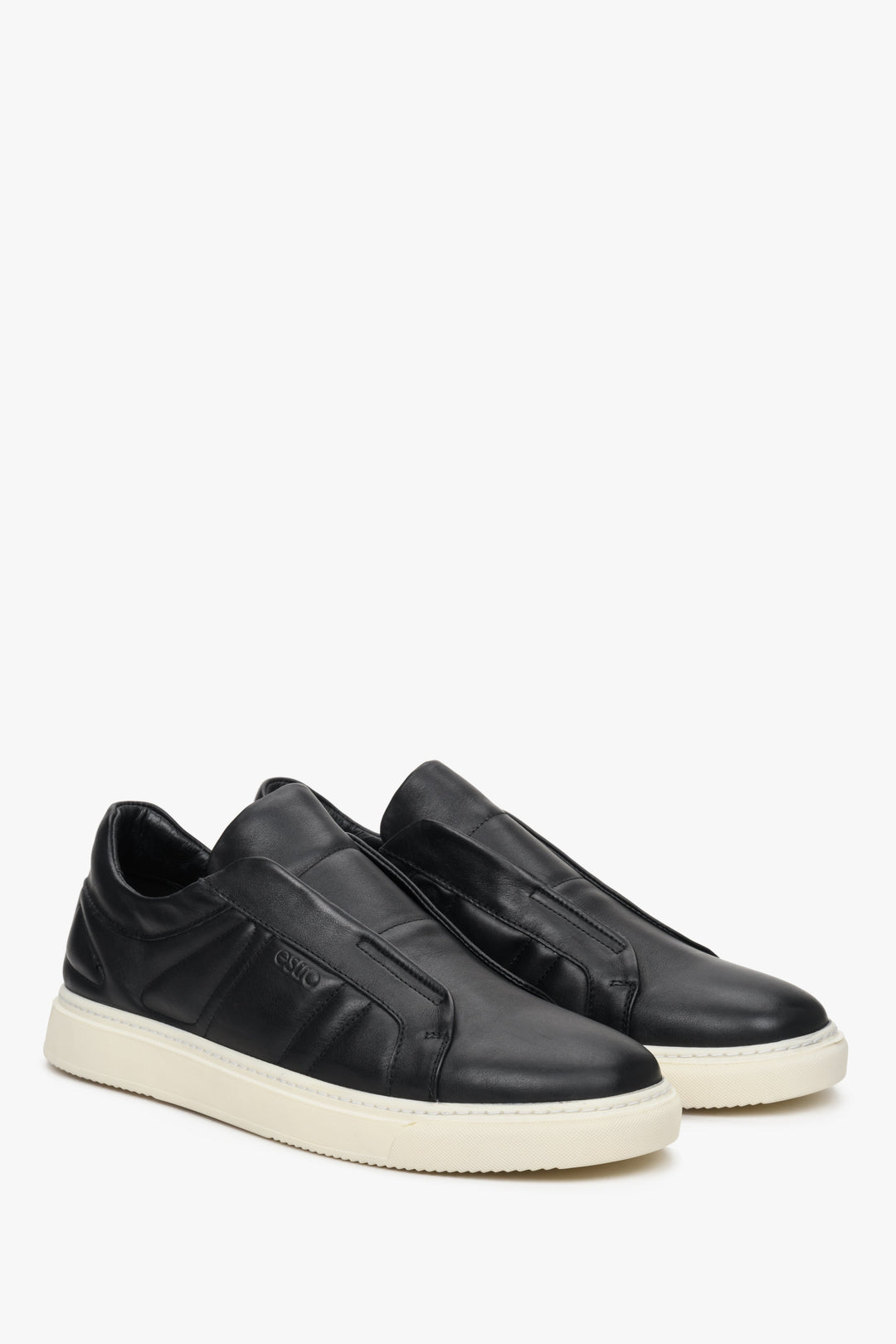 Men's black leather Estro  slip-on sneakers without laces - close-up of the shoe's toe and side seam.