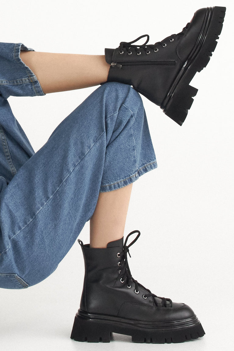 Women's black lace-up fall ankle boots by Estro.