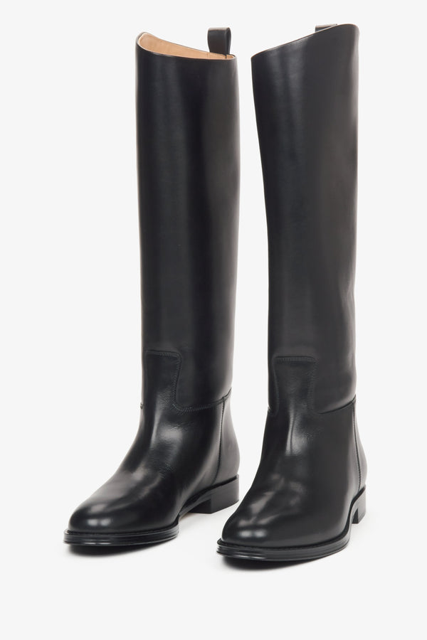 Women's black knee-high boots with a wide shaft made of genuine leather by Estro - front view.