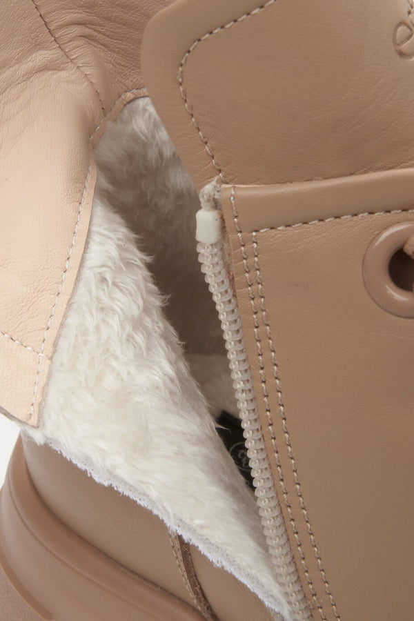 Women's leather brown winter boots with warming lining by Estro - close-up of the interior of the shoe.