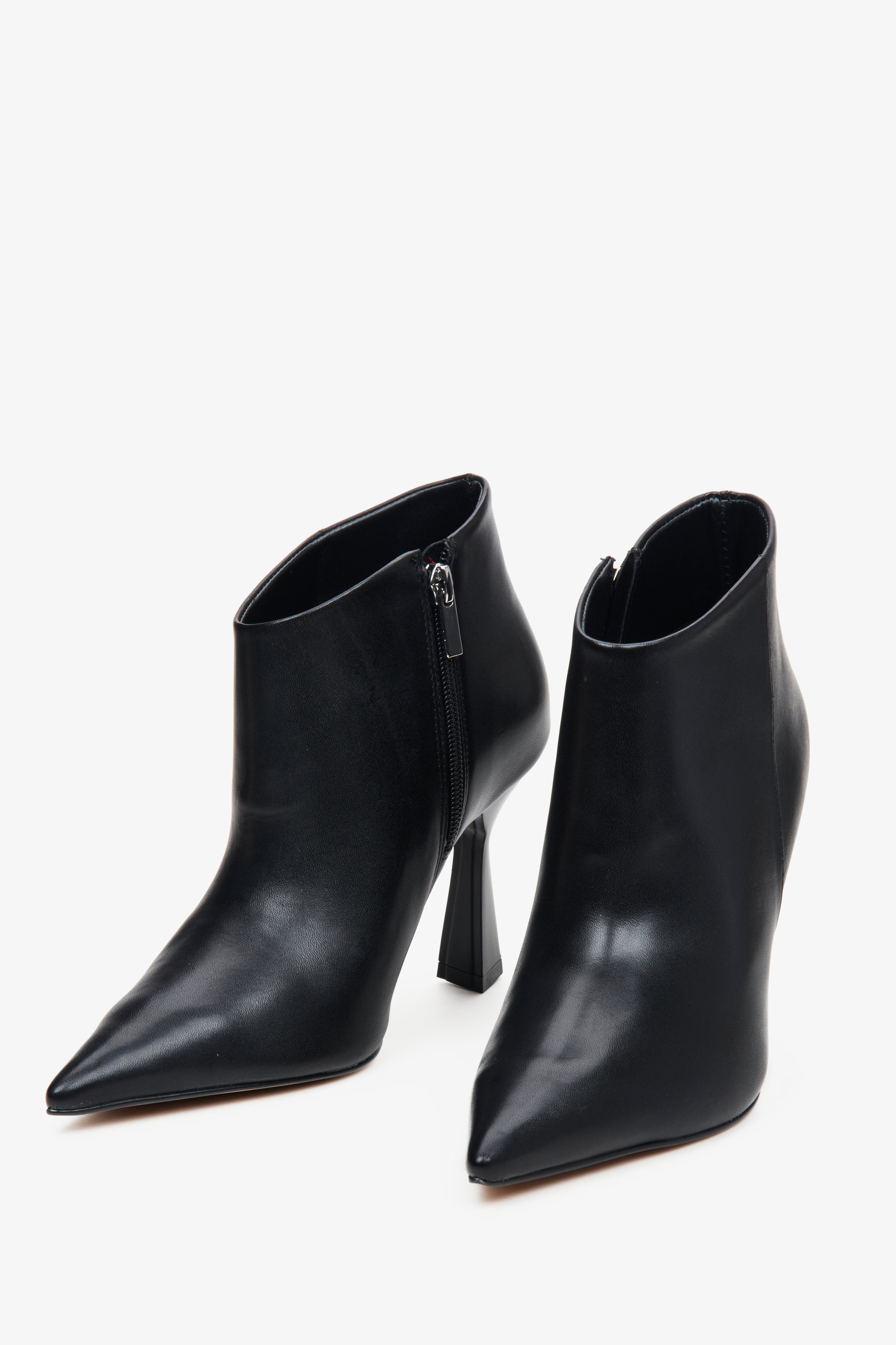 Women's black high-heeled ankle boots in natural leather by Estro - close-up of the toe of the shoe.