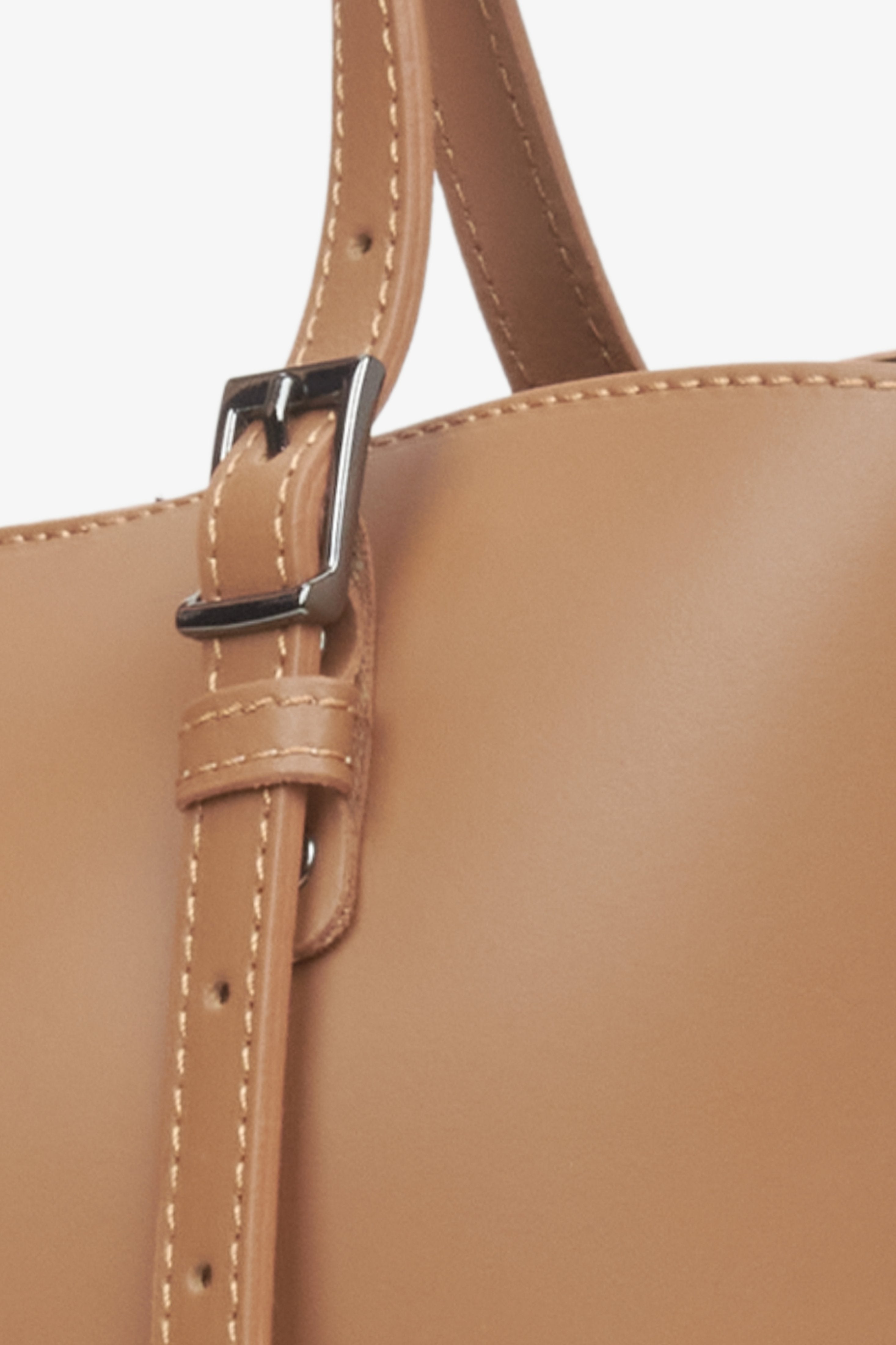 Women's brown leather shopper bag - close-up on details.