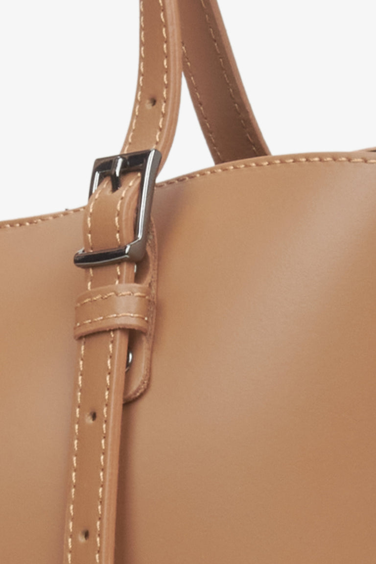 Women's brown leather shopper bag - close-up on details.