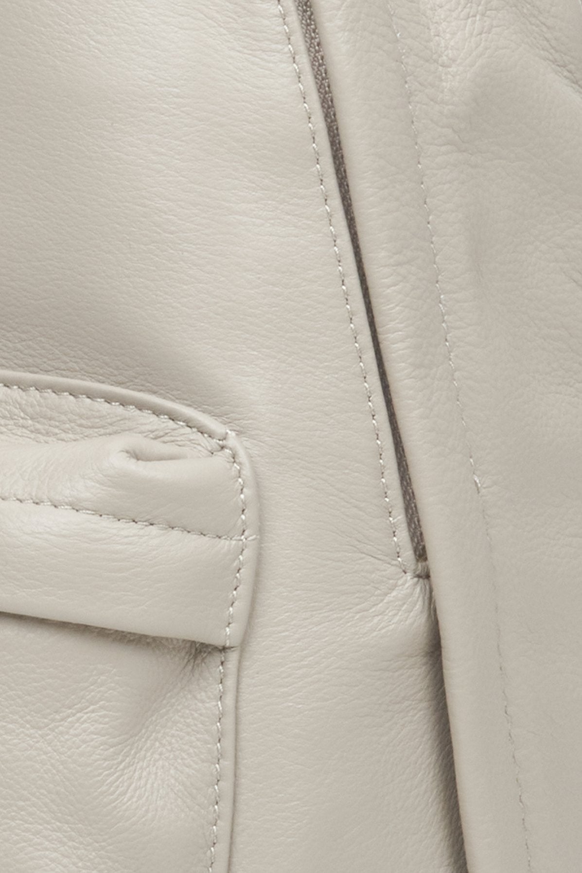 Large women's light grey backpack made of genuine leather by Estro - close-up of the details.