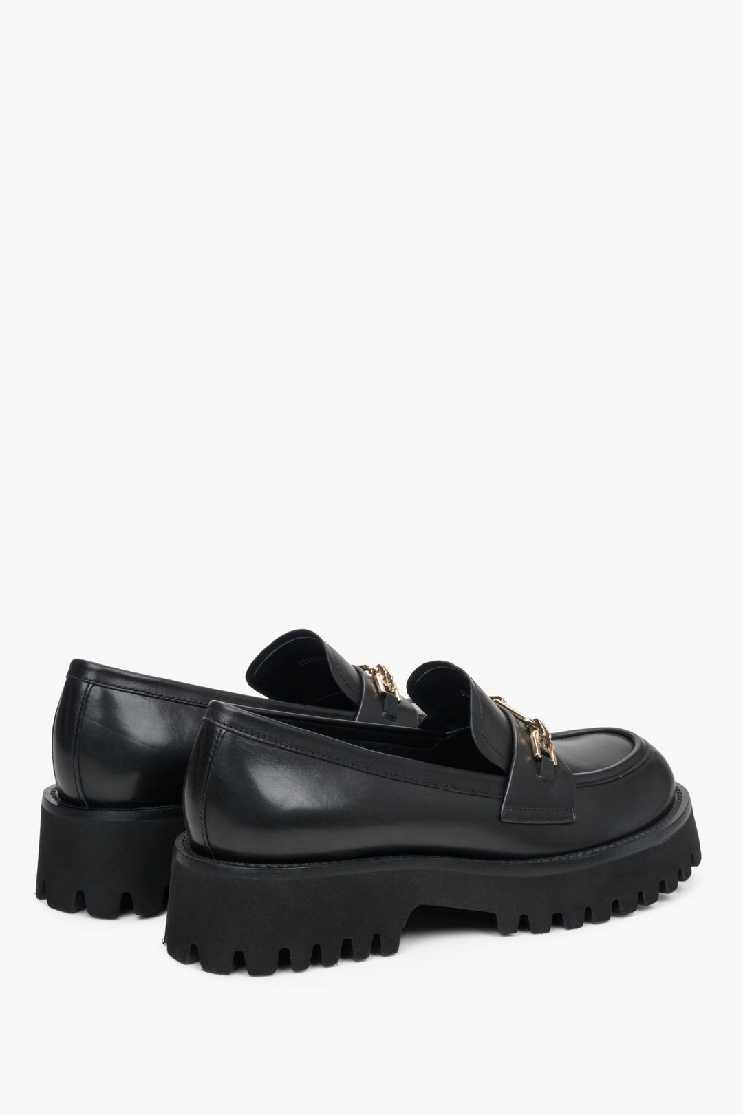 Women's black leather moccasins.