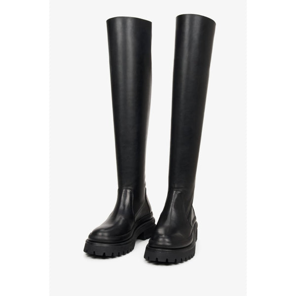 Women's black boots made of genuine leather.