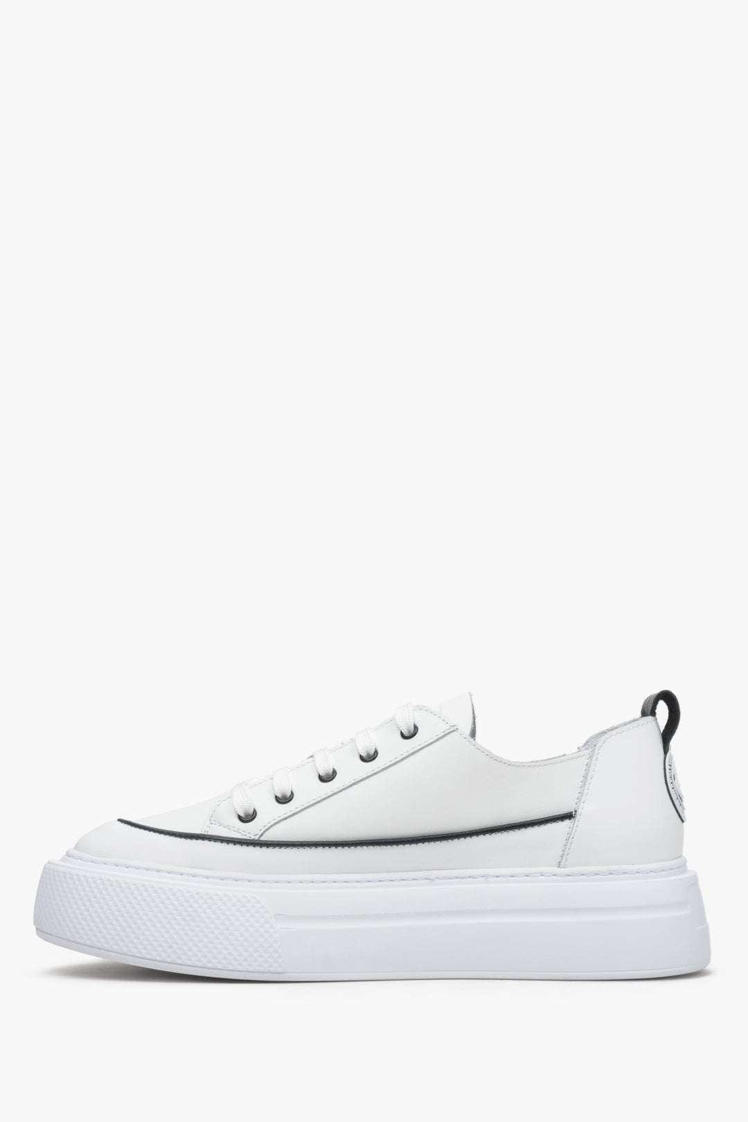 Women's white low top sneakers made of genuine leather - shoe profile.