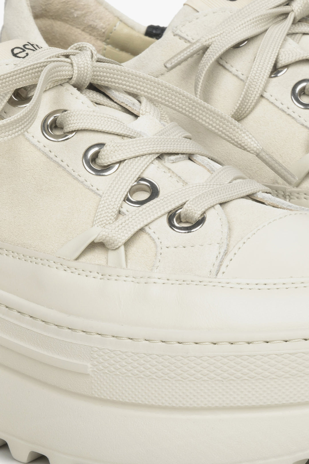 Women's Estro beige sneakers - close-up on details.