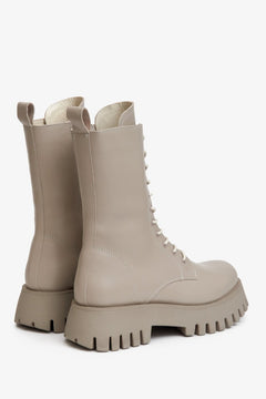 High lace-up women's beige boots by Estro - close-up on the back of the shoe.