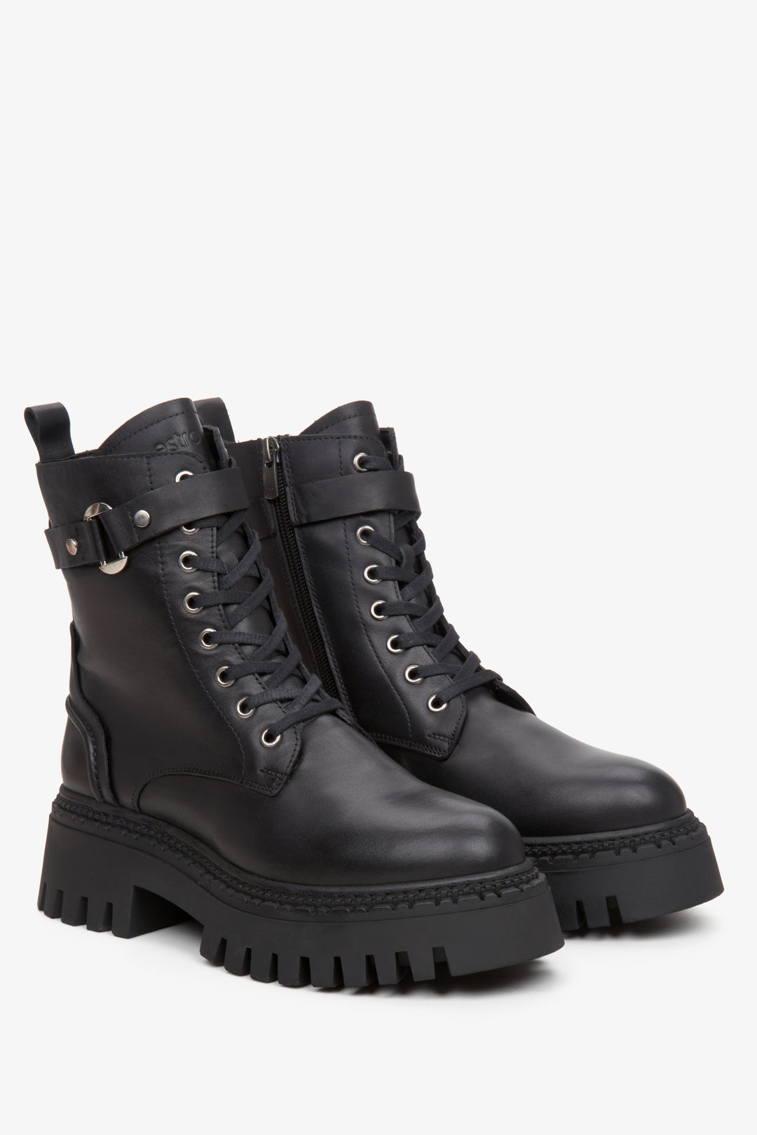 Women's black ankle boots made of genuine leather by Estro.
