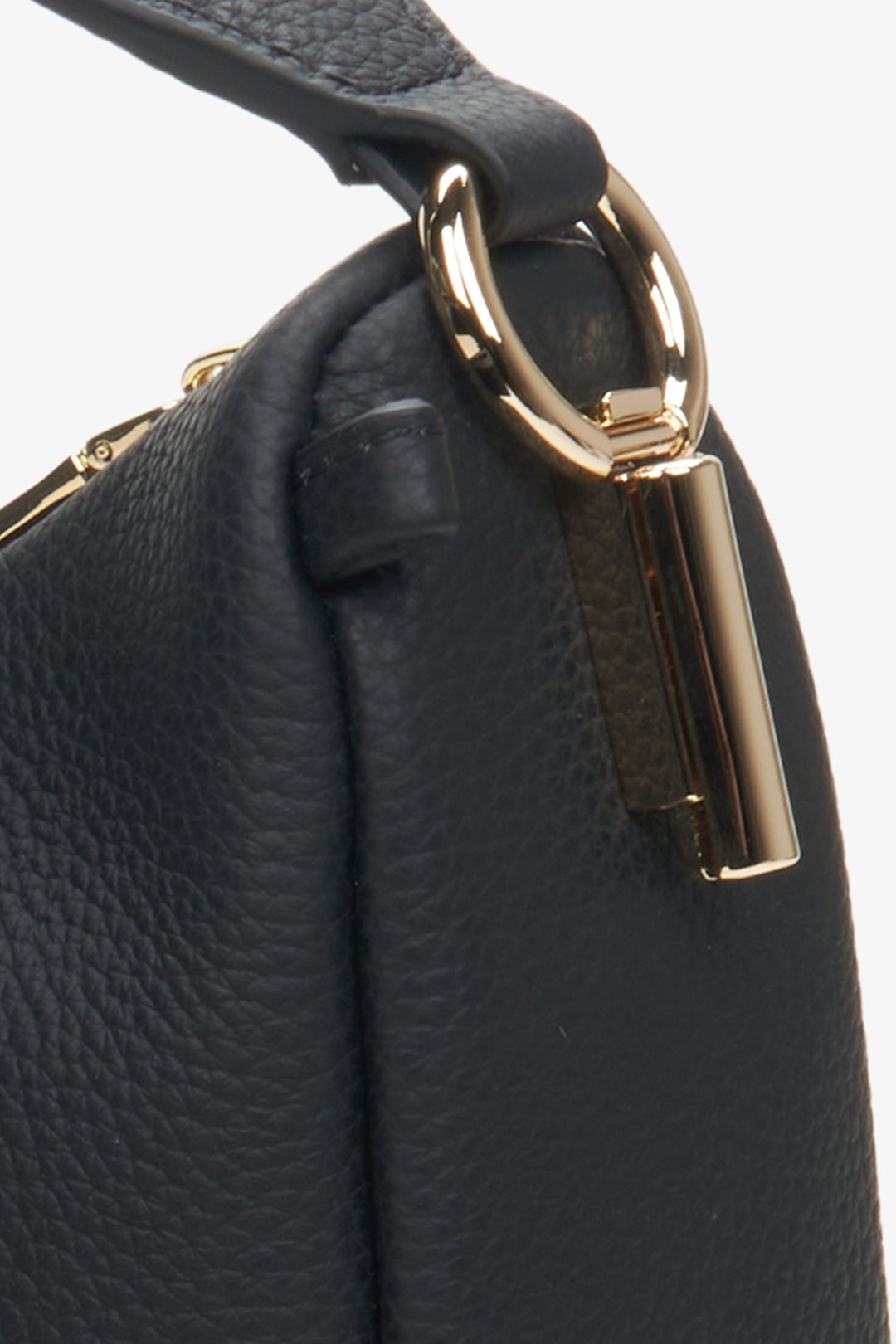 Close-up of the interior of the black leather women's crescent-shaped handbag by Estro.