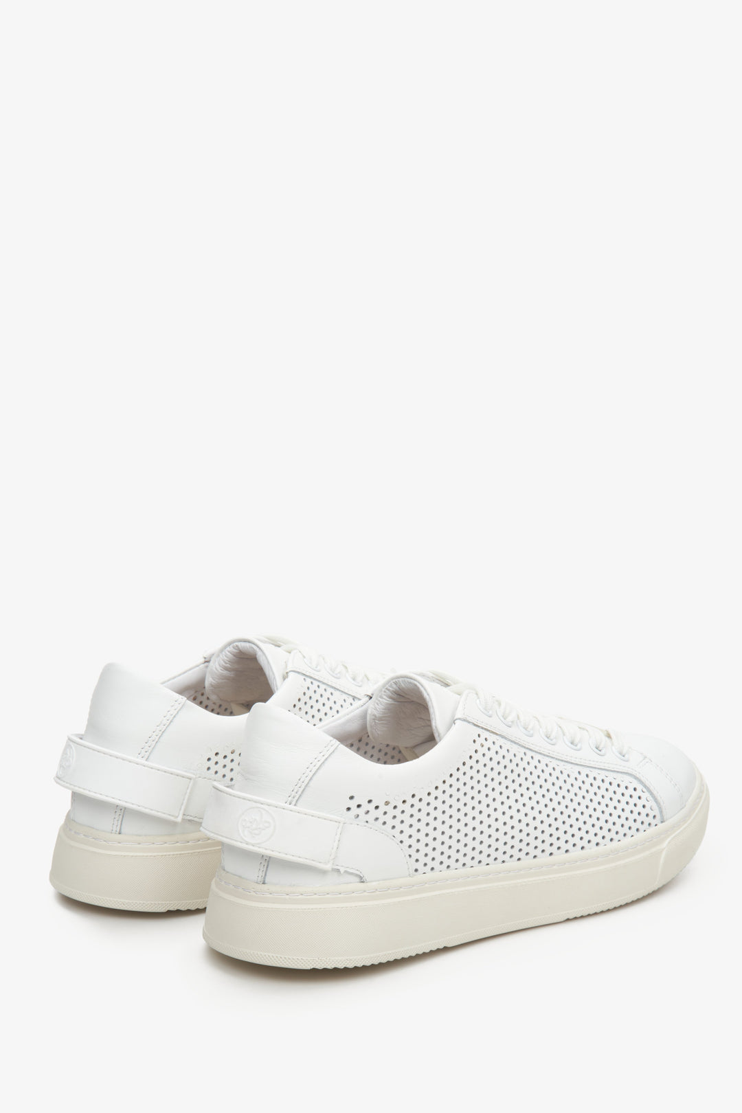 Women's white leather Estro sneakers with perforation for fall/spring - close-up on the heel and side seam.