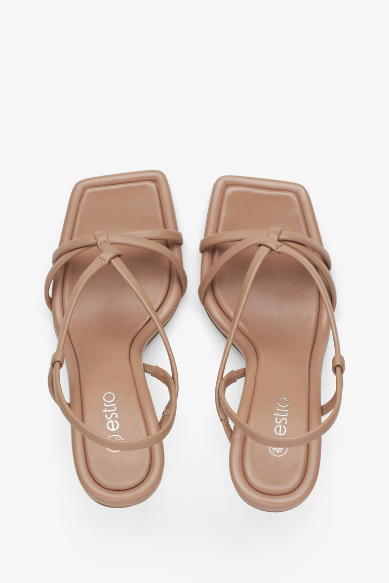 Women's beige sandals on a funnel heel, Estro brand - presentation form above.