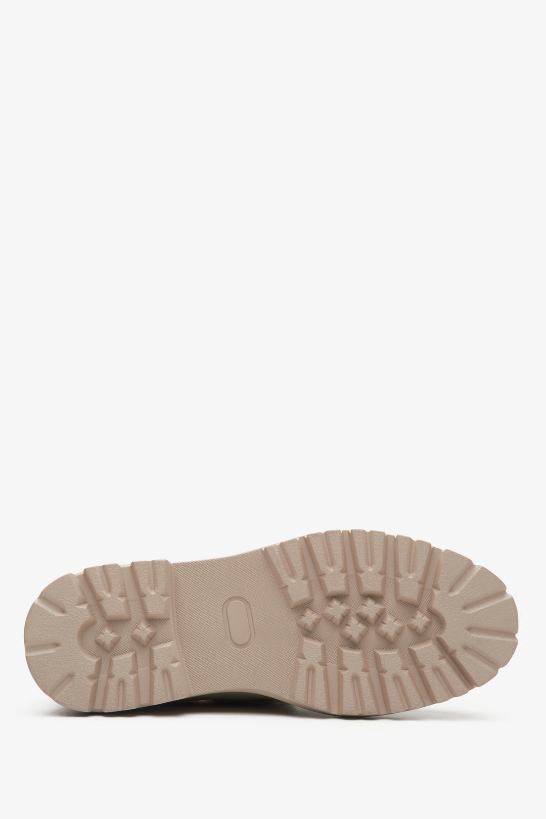 Women's leather moccasins with a glossy finish in beige - close-up on the sole.
